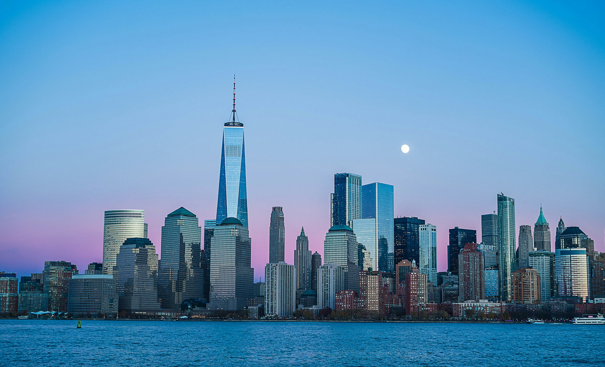 Glass commercial towers at dusk