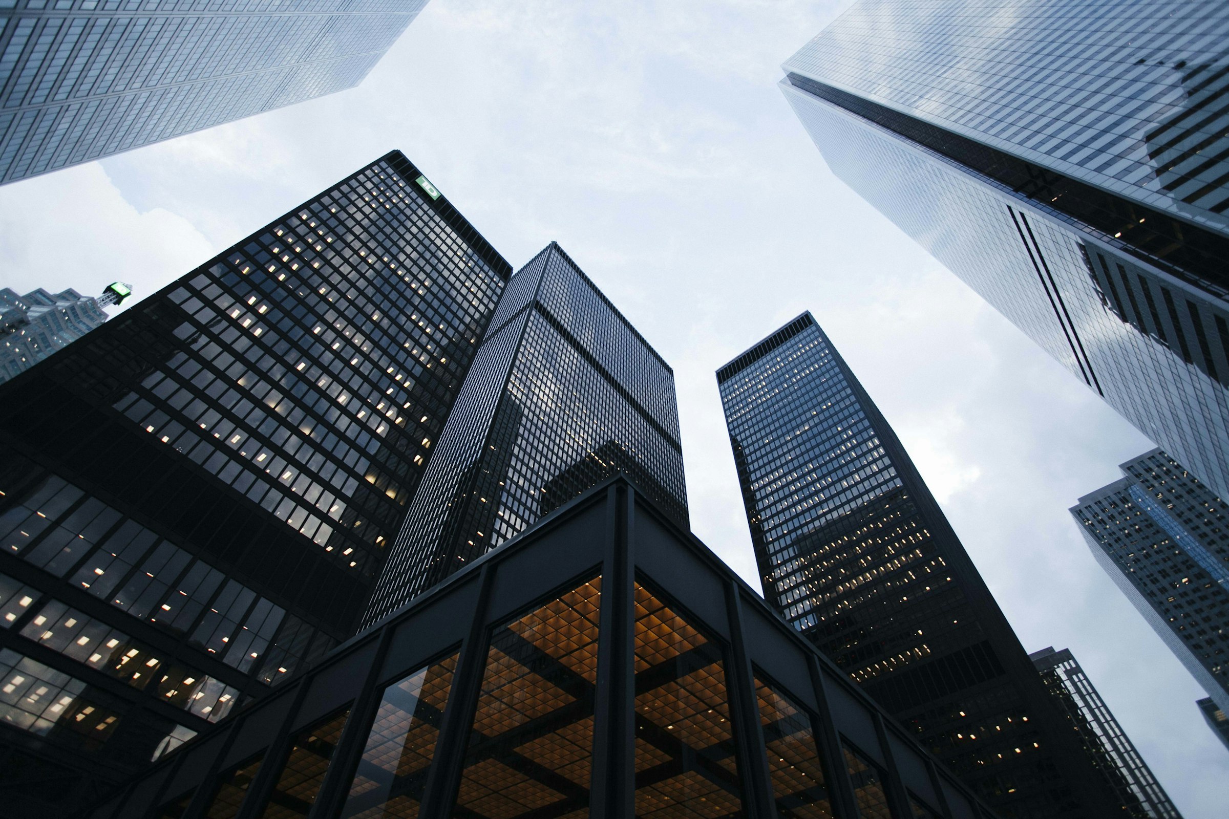 Looking up at glass commercial towers